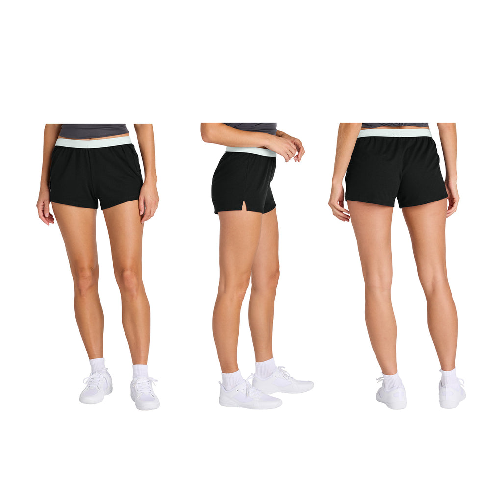 Person wearing blue shorts with a logo on a white background