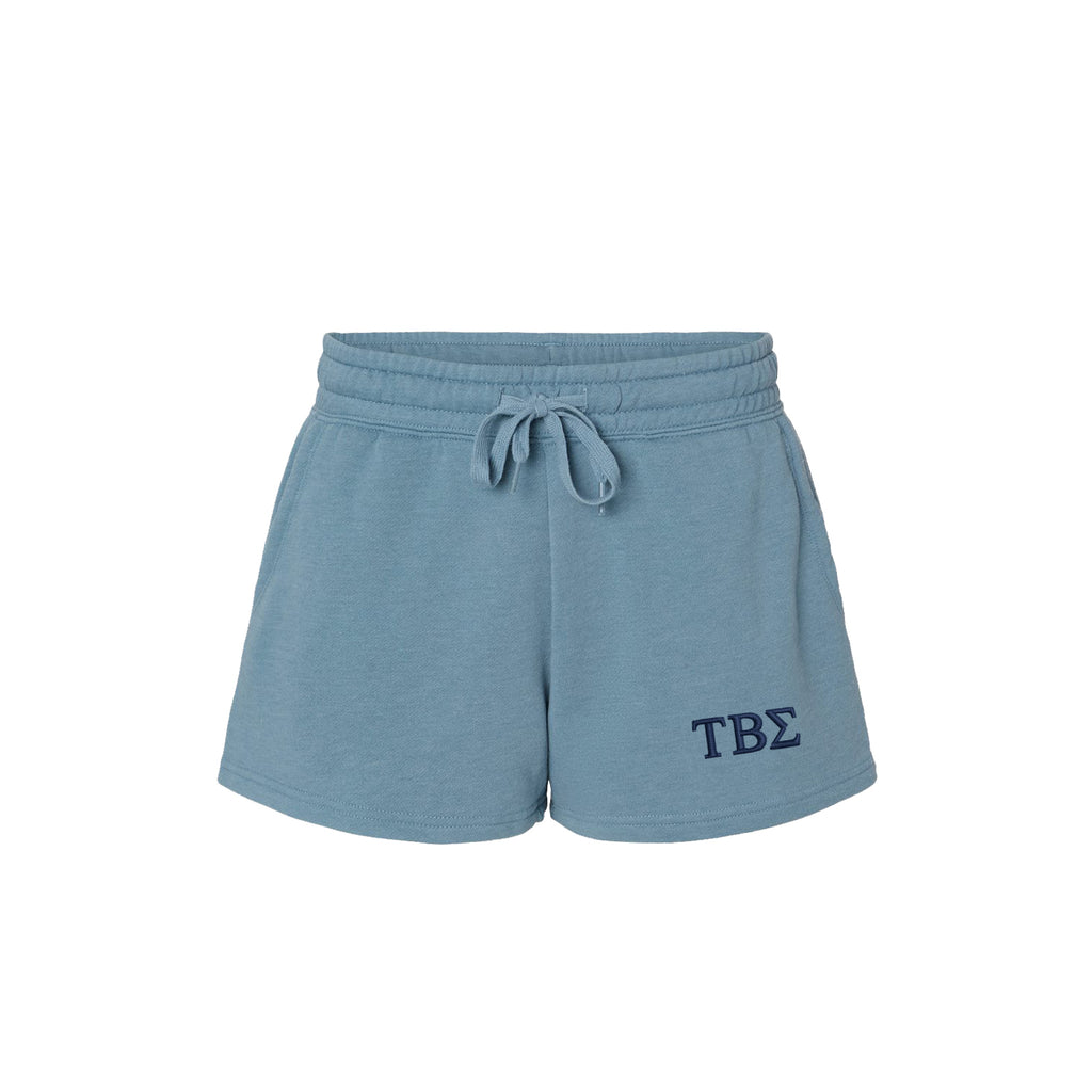 Blue shorts with 'TBS' logo on a white background